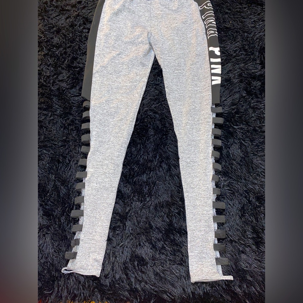 SHEIN leggings w/PINK emblem && cut outs going down each leg, size large